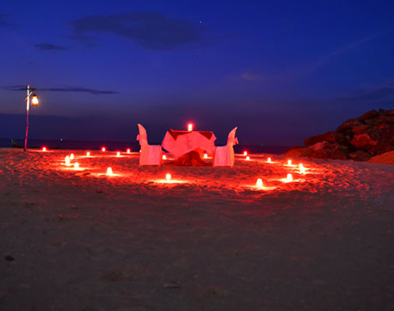 candle light dinner on beach in mararikkulam